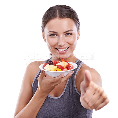 Buy stock photo Studio, model and fruit in portrait with thumbs up, morning and nutrition with vitamins for wellness. Young woman, happiness or face in mockup by organic strawberry, bowl or fibre by white background