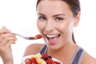 Buy stock photo Studio, woman or fruit in portrait with eating, morning or nutrition in vitamins for wellness. Young model, breakfast or happy face in mockup for organic strawberry, bowl or fibre by white background