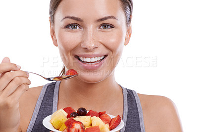 Buy stock photo Studio, model and fruit in portrait with eating, morning and nutrition with vitamins for wellness. Young woman, breakfast or happy face in mockup by organic strawberry or bowl by white background