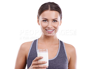 Buy stock photo Portrait, woman and drink milk for nutrition benefits and diet with happiness in white background of studio. Person, smile and enjoy dairy liquid for calcium, energy and vitamin d in healthy food