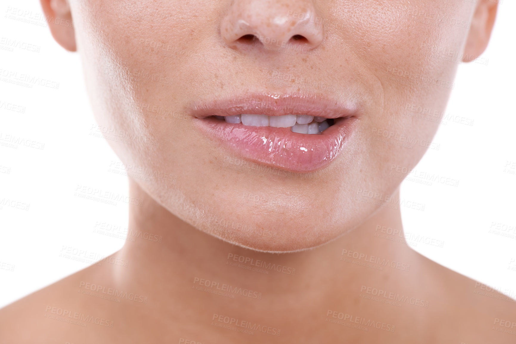 Buy stock photo Woman, flirting and biting lips closeup in white background, mock up and studio with beauty. Model, gesture and nervous body language or excited person with teeth on skin of mouth in backdrop