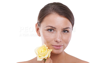 Buy stock photo Beauty, portrait and woman with rose in studio for eco dermatology, natural aesthetics or floral skincare on white background. Face, model and flowers for shine, wellness cosmetics and sustainability