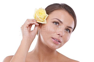 Buy stock photo Beauty, face and woman with rose in studio for eco dermatology, natural aesthetics or floral skincare on white background. Model thinking with flowers for shine, wellness cosmetics and sustainability
