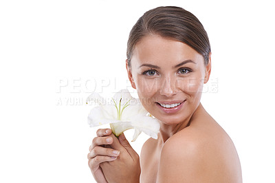 Buy stock photo Skincare, portrait and woman with lily flowers in studio for dermatology, natural beauty or eco aesthetics on white background. Happy model, floral plants or organic wellness of sustainable cosmetics