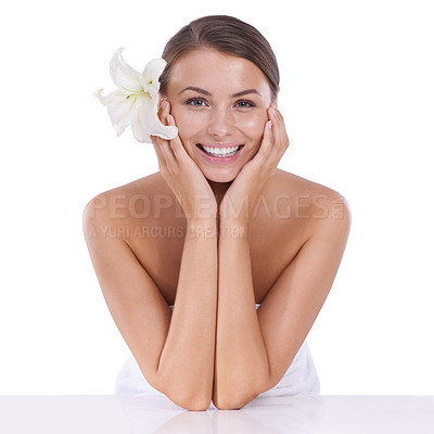 Buy stock photo Beauty, lily and portrait of happy woman in studio for natural skincare, eco aesthetics or sustainable dermatology on white background. Model with flowers in hair for blossom, shine or pure cosmetics