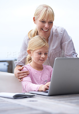 Buy stock photo Laptop, research and mother reading with child helping for online school homework at house. Smile, technology and happy young mom teaching girl kid student on computer for elearning together.