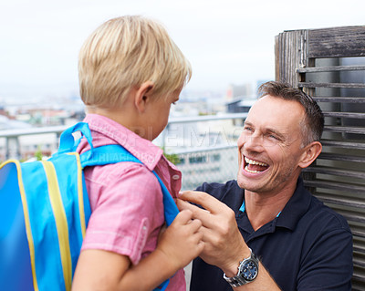Buy stock photo Happy, father and helping child with backpack to be ready in morning, back to school and routine at home. Dad, love and pride for kid to start learning in education with support, care and happiness