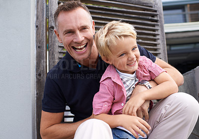 Buy stock photo Laughing, smile and father tickling child for bonding together in backyard at family home. Happy, funny and dad playing and having fun with boy kid by wood gate for quality time outdoor a house.