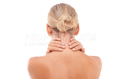 Buy stock photo Neck pain, injury and woman in a studio with discomfort, stress or ache after a spa body care treatment. Self care, sore and back view of a female model with a muscle sprain by a white background.