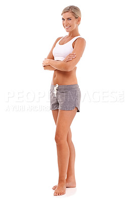 Buy stock photo Portrait, health and fitness with a model woman in studio on a white background standing arms crossed. Training, workout or exercise with an attractive young female athlete posing to promote wellness