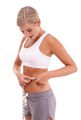 Buy stock photo Health, fitness and woman with tape measure for abdomen in studio isolated on a white background. Diet, wellness and slim female model measuring waist to track weightloss goals, progress or targets.