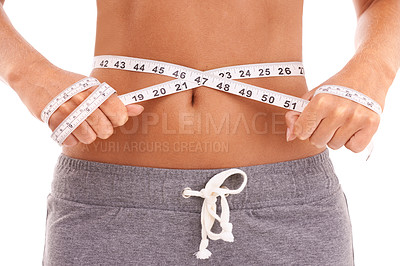 Buy stock photo Fitness, health and woman with tape measure for stomach in studio isolated on a white background. Diet, wellness and slim female model measuring waist to track weightloss goals, progress or targets.