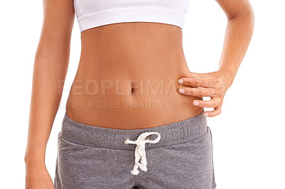 Buy stock photo Diet, health and woman pinch stomach after weight loss, body transformation or liposuction on white background studio. Wellness lifestyle, cellulite or abdomen of healthcare girl with fitness results