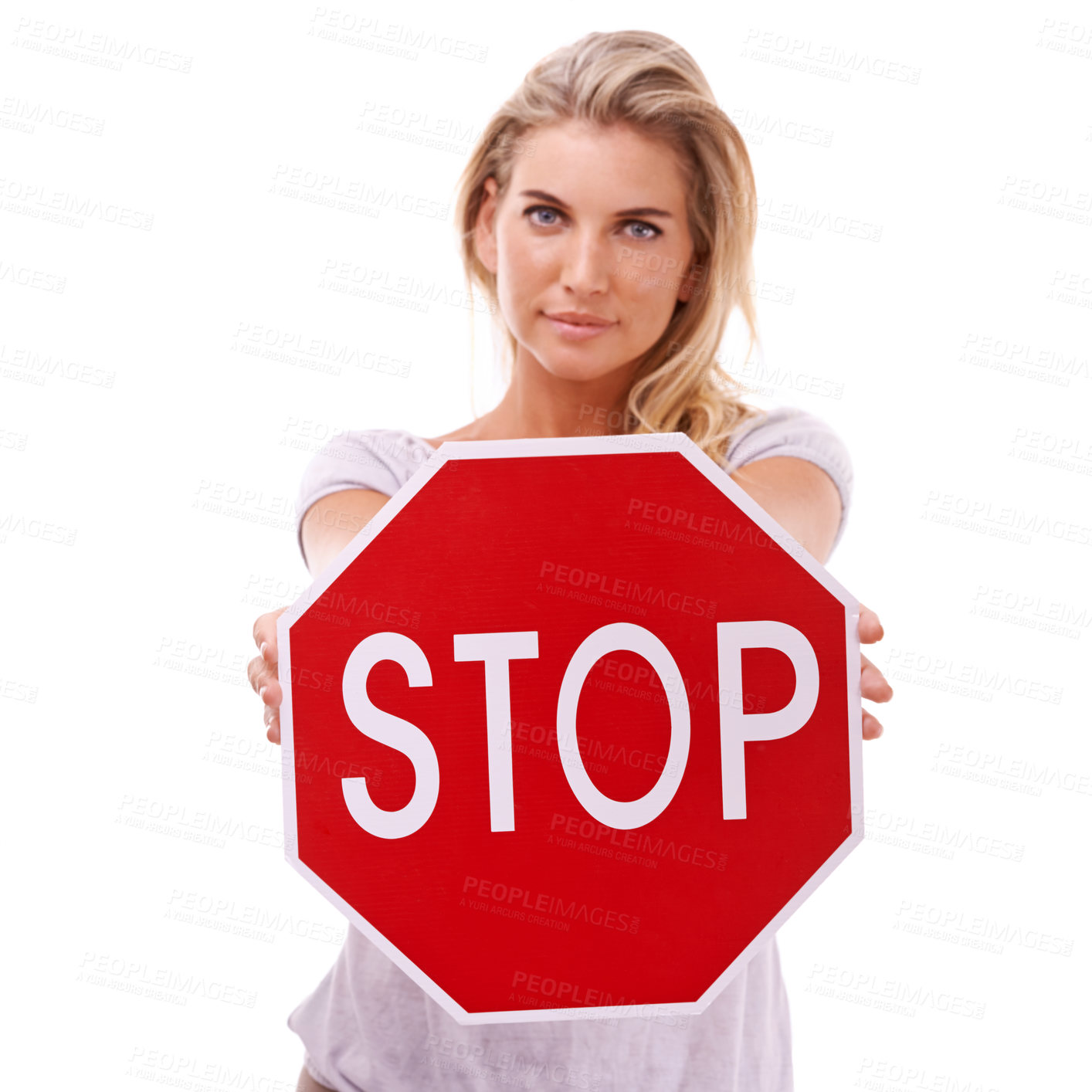 Buy stock photo Woman in portrait with stop road sign, signage and traffic rules, safety and warning against white background. Danger with stop sign, road regulations and red sign with text, caution and attention