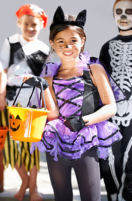Buy stock photo Portrait of a group of little children trick-or-treating on halloween