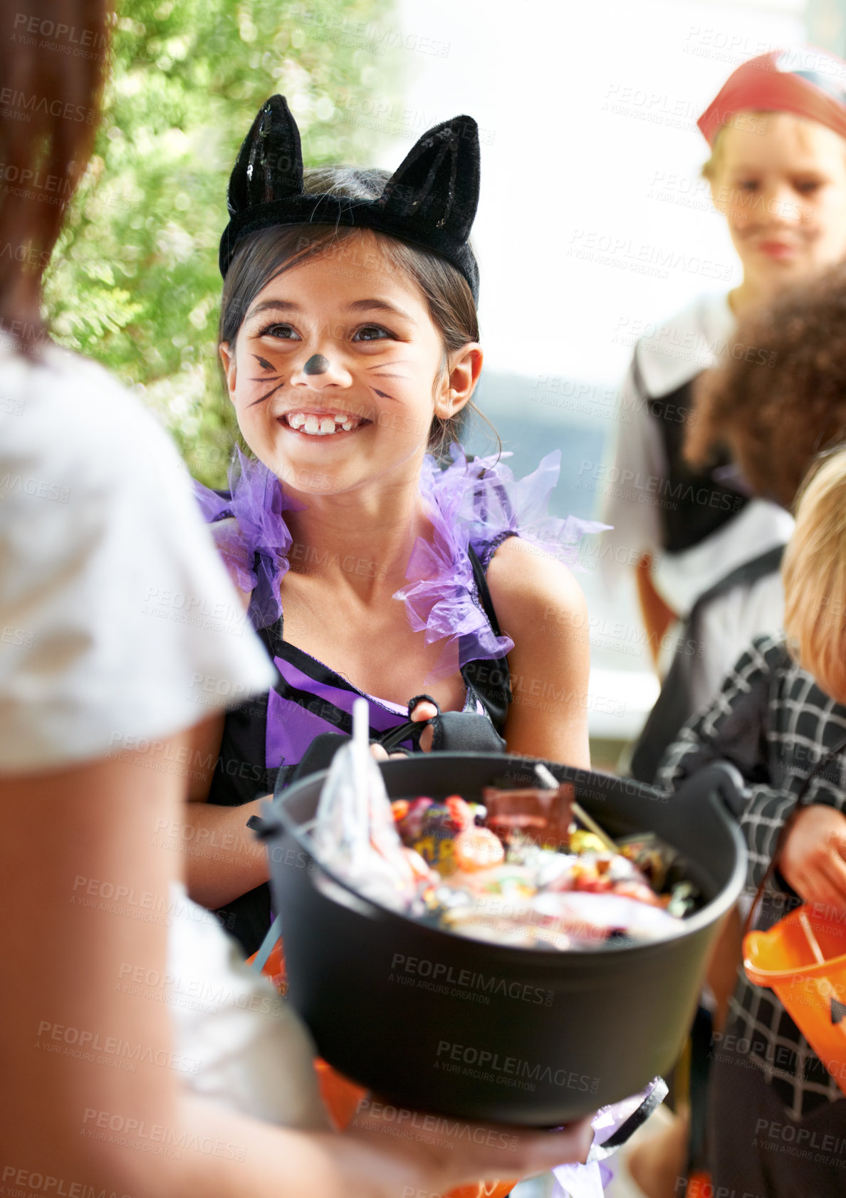 Buy stock photo Little children trick-or-treating on halloween