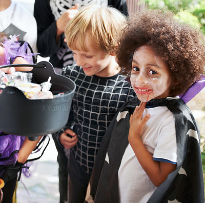 Buy stock photo Portrait, halloween and neighborhood children in costume for trick or treat tradition together. Friends, candy and fancy dress with group of kids collecting sweets for holiday celebration in fall