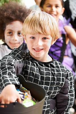 Buy stock photo Portrait of happy little children trick-or-treating on halloween