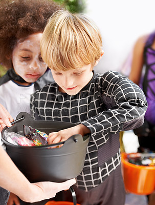 Buy stock photo Children, halloween candy and group of friends in neighborhood together for trick or treat tradition. Kids, youth and celebration with young boys collecting sweets for spooky holiday or vacation