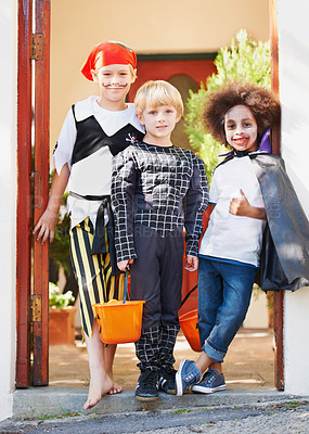 Buy stock photo Children, halloween and celebration in costume or portrait in front yard, holiday and spooky outfit or tradition. Kids, face and role play with basket, fancy dress and happiness in garden of home 