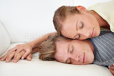 Buy stock photo A woman lying on her man's back