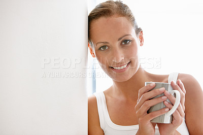 Buy stock photo Smile, coffee and portrait of woman in a house with positive mindset, attitude or chilling at home. Happy, face and female person with tea in living room for morning, routine or moment of reflection