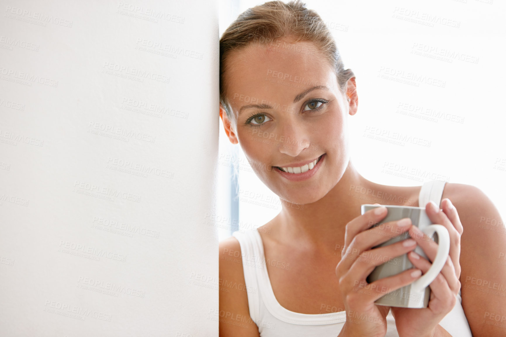 Buy stock photo Smile, coffee and portrait of woman in a house with positive mindset, attitude or chilling at home. Happy, face and female person with tea in living room for morning, routine or moment of reflection