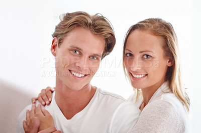 Buy stock photo Love, portrait and couple hug in a house with support, bonding and security in their home together. Face, gratitude and people embrace in a living room with trust, commitment and romantic loyalty
