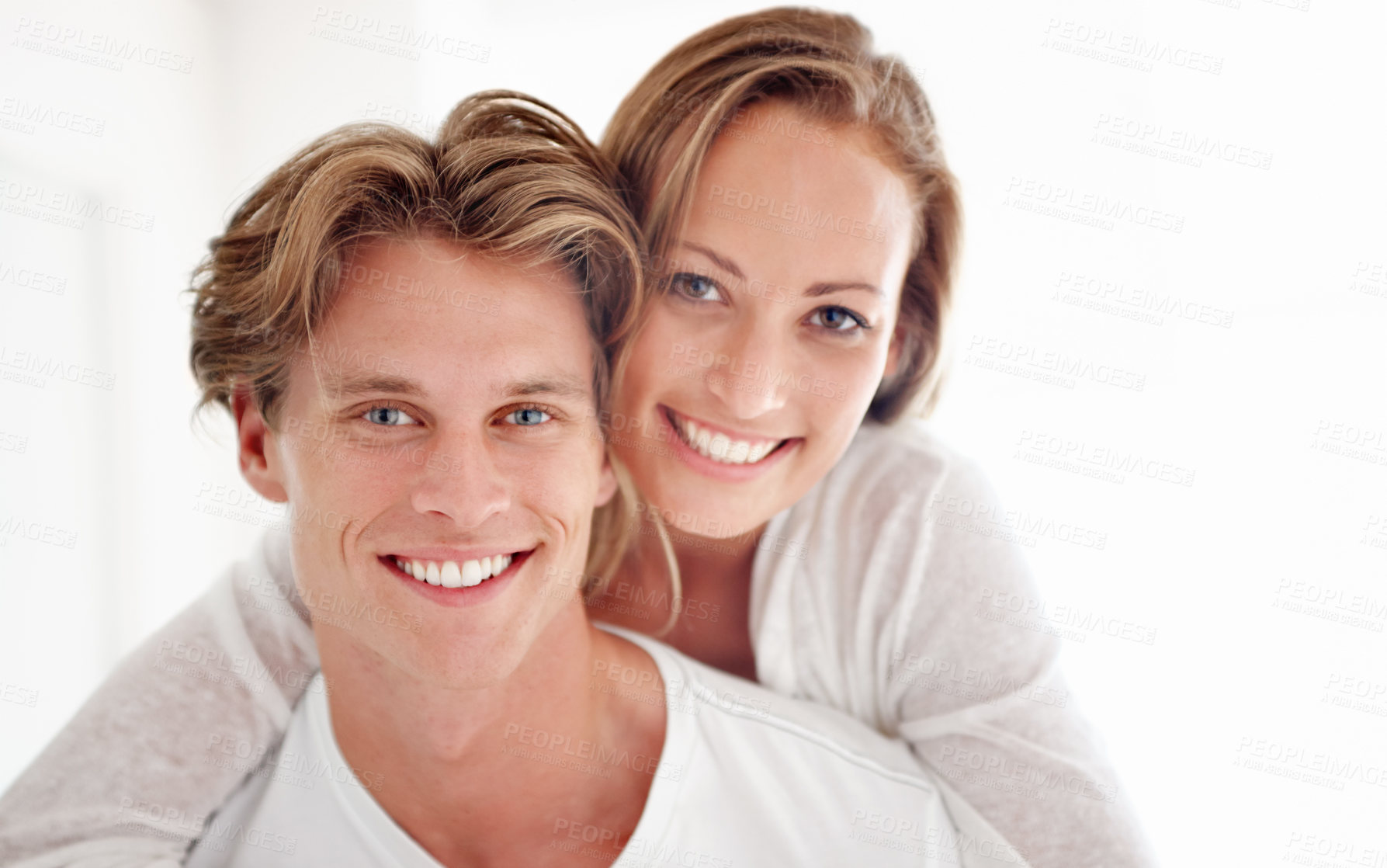 Buy stock photo A happy young couple having an intimate moment in their home