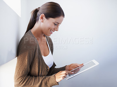 Buy stock photo Research, designer or happy woman with tablet for networking on social media app or website. Internet, scroll or female person with technology for planning, online project and information in office