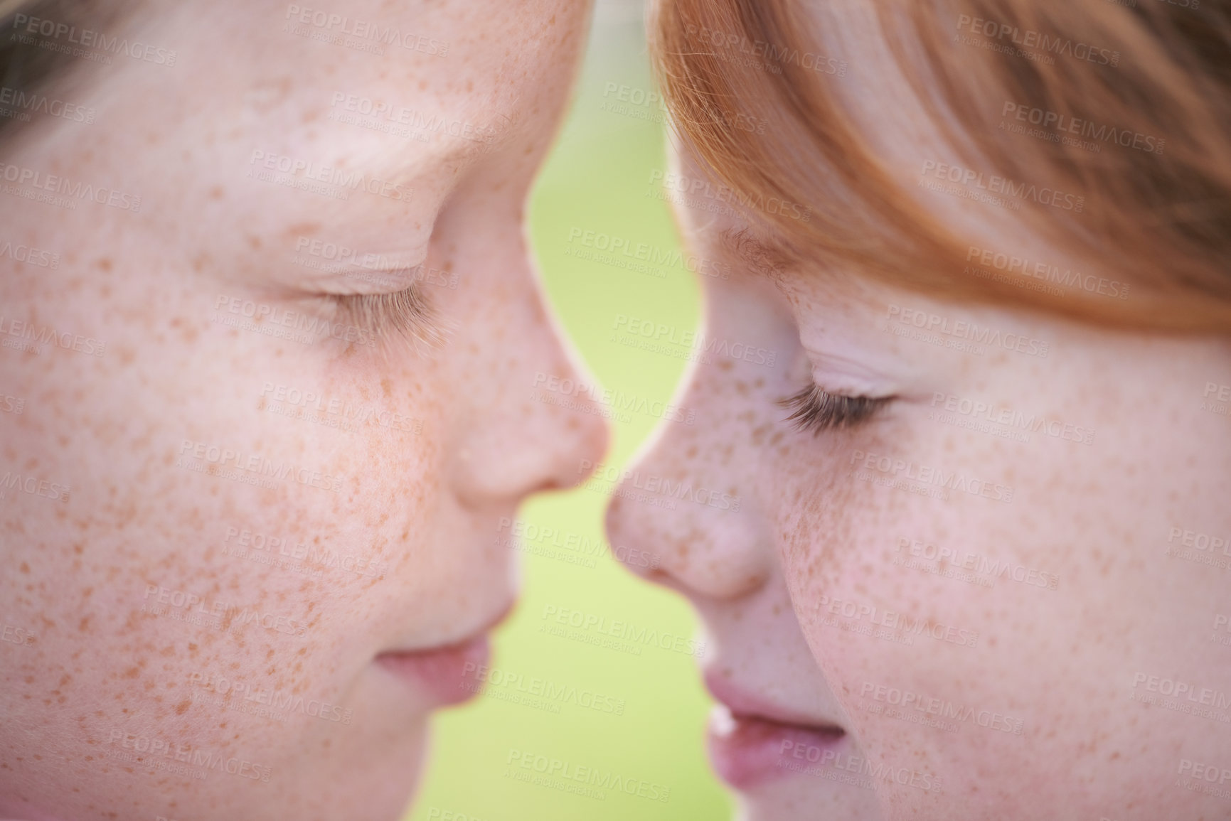 Buy stock photo Face, children or girl siblings in park bonding, hugging and playing together with eyes closed. Nature, ginger kids and sisters on outdoor trip with care, love or friendship in a garden as a family