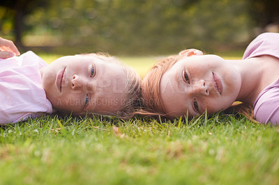 Buy stock photo Grass, kids or portrait of sisters relax in nature for bond or holiday together with support or joy. Park, relax or faces of children siblings in field with freedom, love or friendship in garden