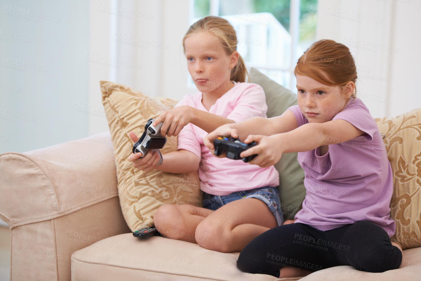 Buy stock photo Home, joystick or happy kids gaming to play online with controller on couch or sofa in living room. Children, fun experience or young girl gamers with smile for video games, contest or technology