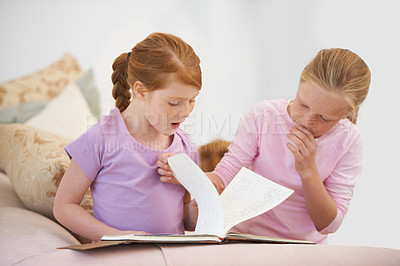 Buy stock photo Sisters, surprise or kids reading book for learning, development or studying literacy together. Children education, wow or girl siblings in home for storytelling, surprise or knowledge of literature