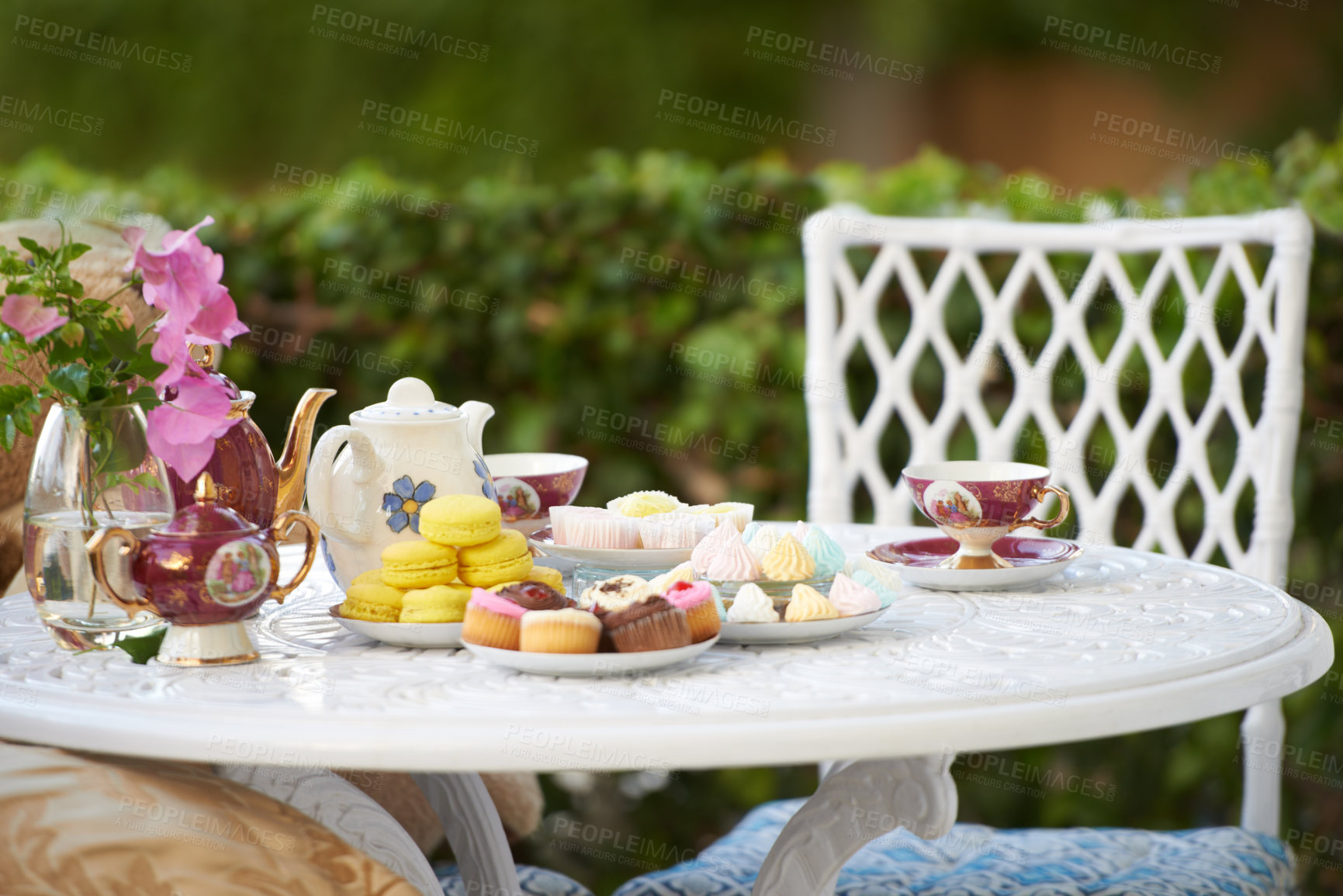 Buy stock photo A table decked out with tasty treats and tea