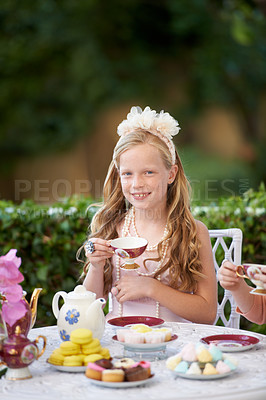 Buy stock photo Girl, kid and portrait in garden with tea party for birthday, celebration and playing outdoor with cake. Person, child and face with happiness in backyard of home or house with cup or flower in hair 