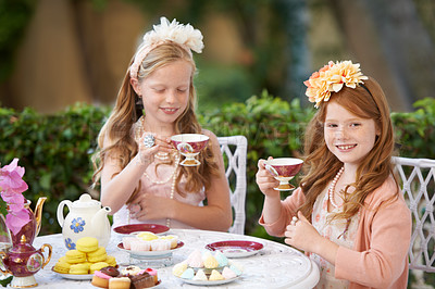 Buy stock photo Tea, party and girl children are playing with fine china, celebration and fun in backyard. Relax, spring with cake or dessert, beverage or drink with friends outdoor in garden for game or birthday