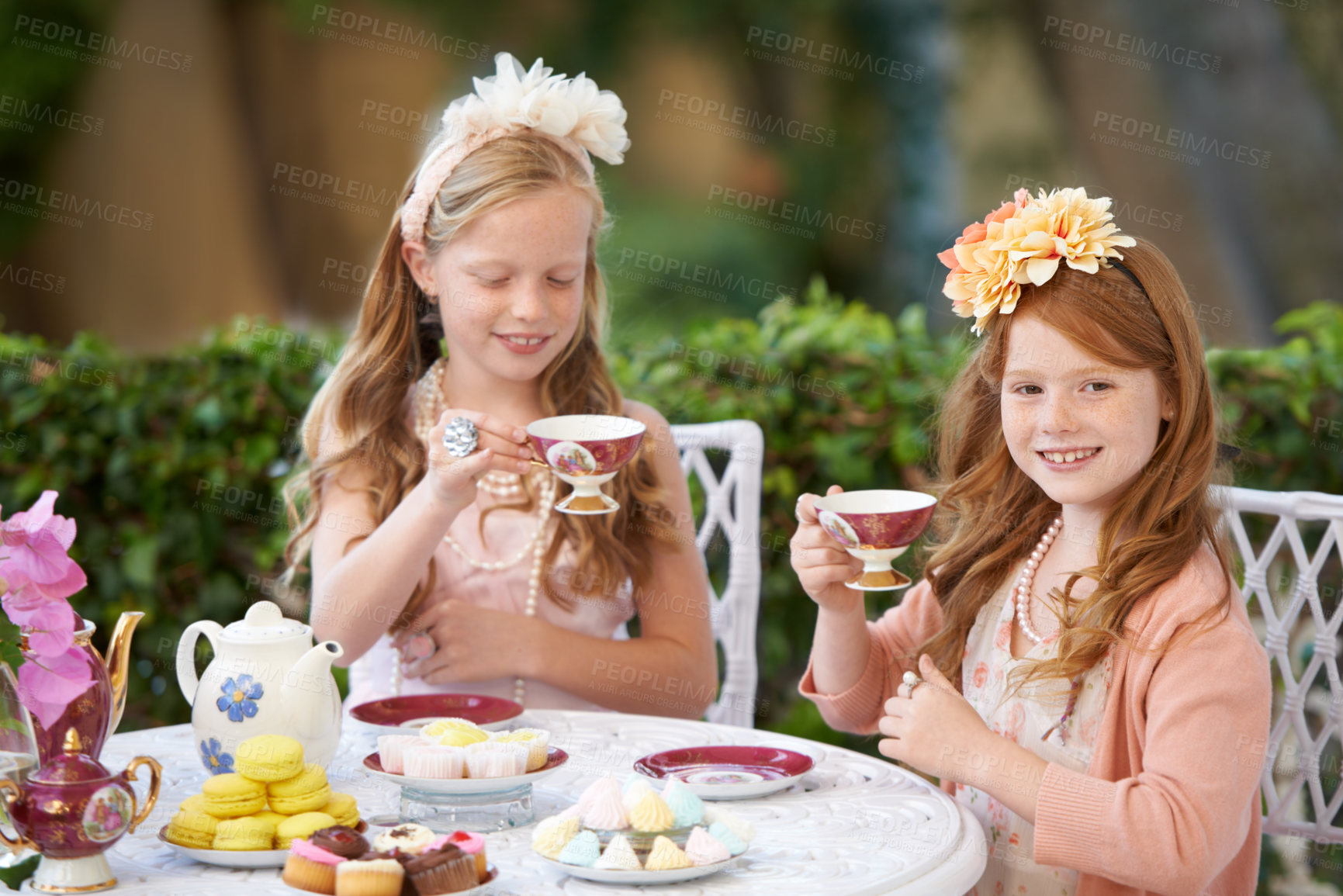 Buy stock photo Tea, party and girl children are playing with fine china, celebration and fun in backyard. Relax, spring with cake or dessert, beverage or drink with friends outdoor in garden for game or birthday