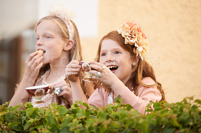 Buy stock photo Girl, friends and tea party in backyard for happy dress up game, fantasy or playing. Female people, siblings and hot drink in garden nature for summer bonding fun or kid lunch, birthday or beverage