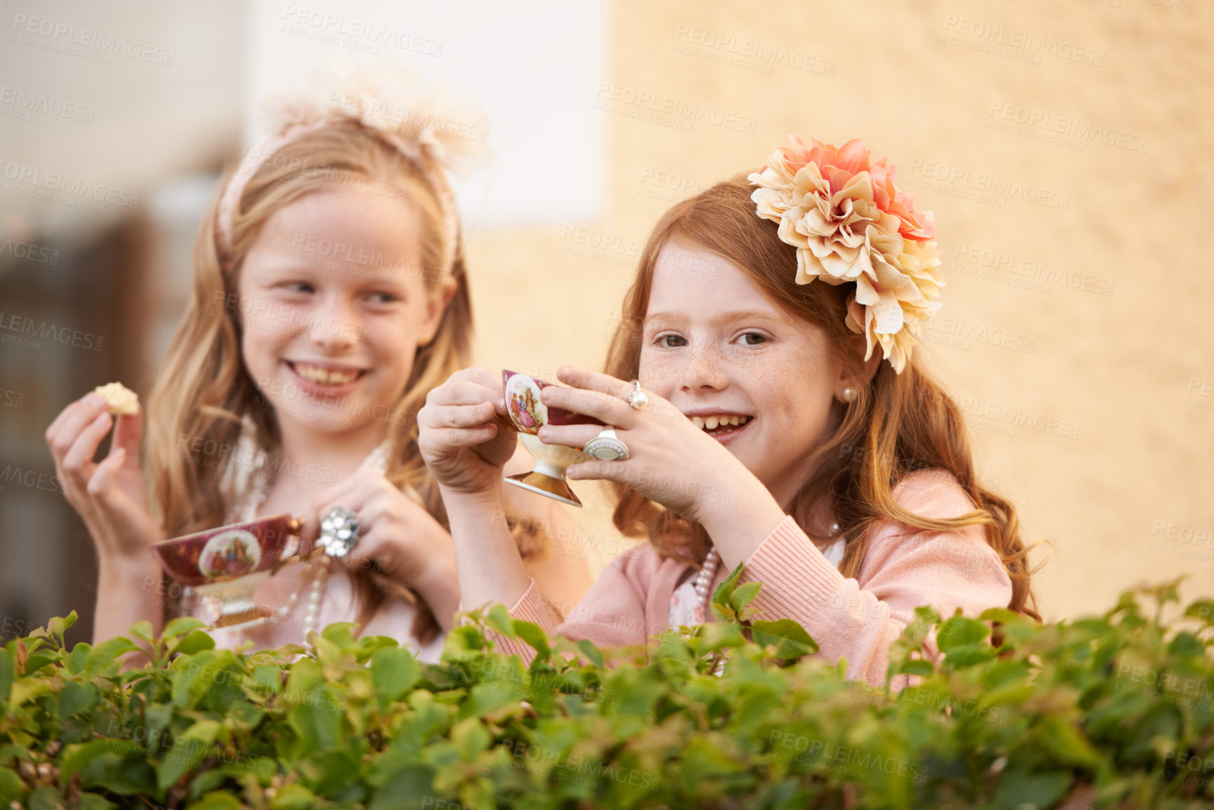 Buy stock photo Girl, friends and tea cup in garden for party snack for happy dress up game, fantasy or play. Female people, nature and hot drink in backyard for summer bonding fun or lunch, birthday or beverage