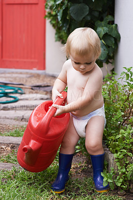 Buy stock photo Kid, garden and boy with a water can, nature and playing with fun, happiness and summer. Grass, child development and baby with a toy, environment and relaxing with break and learning with growth