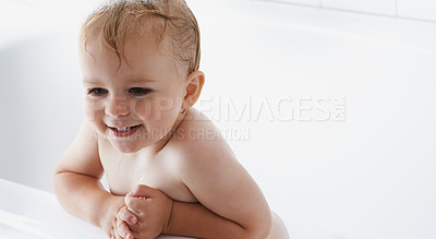 Buy stock photo Face of baby in bath, clean smile or mockup in morning routine for health, wellness or body care in home. Happy toddler washing in bathtub for hygiene, relax and calm child sitting in tub in bathroom