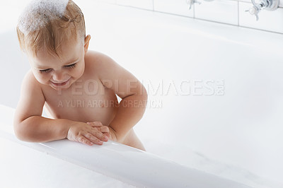 Buy stock photo Happy baby in bath with soap, bubbles and cleaning on mockup in morning routine for hygiene, wellness and care in home. Toddler washing in foam with smile, relax and laughing child in tub in bathroom