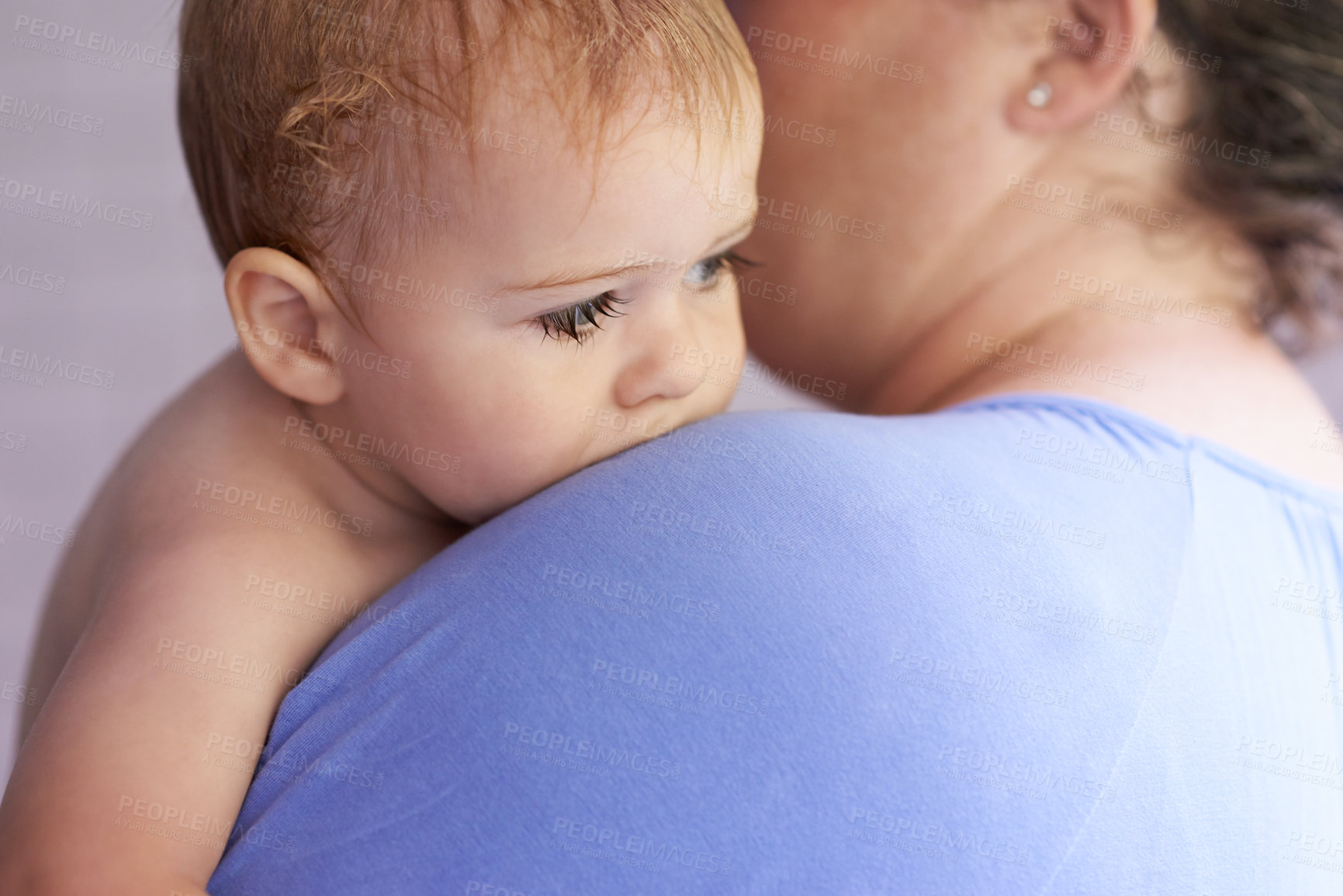 Buy stock photo Mom, comfort and holding baby with calm, sleepy or tired in home with support and care. Mother, love and carry child in arms bonding with kindness in bedroom and infant with trust in mama and family