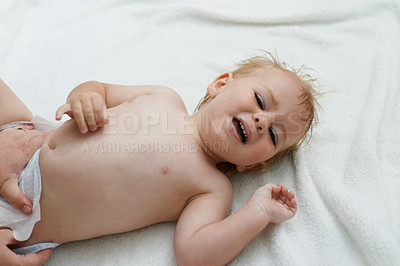 Buy stock photo Sad, crying and baby boy at home, diaper and distress with naughty childhood personality. Problem, emotional and frustrated young kid, bedroom and toddler with development, body and changing