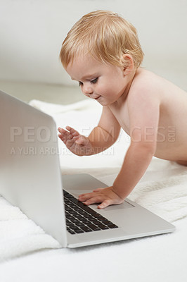 Buy stock photo Laptop, games and baby on a floor with cartoon, streaming or subscription service in a house. Learning, child development and curious boy kid with computer for educational gaming, app and fun