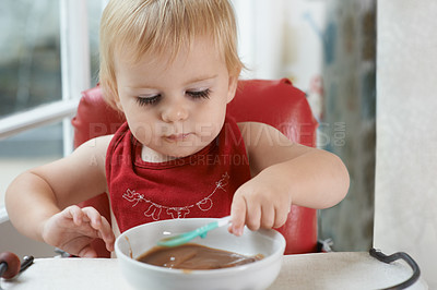 Buy stock photo Hungry, sweet and baby eating porridge for health, nutrition or child development at home. Food, cute and girl toddler or kid enjoying an organic puree meal for lunch or dinner in high chair at house