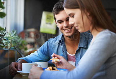 Buy stock photo Food, happy and couple eating in cafe, care and bonding together on valentines day date in the morning. Smile, man and woman in restaurant with breakfast coffee drink, love and relationship in shop