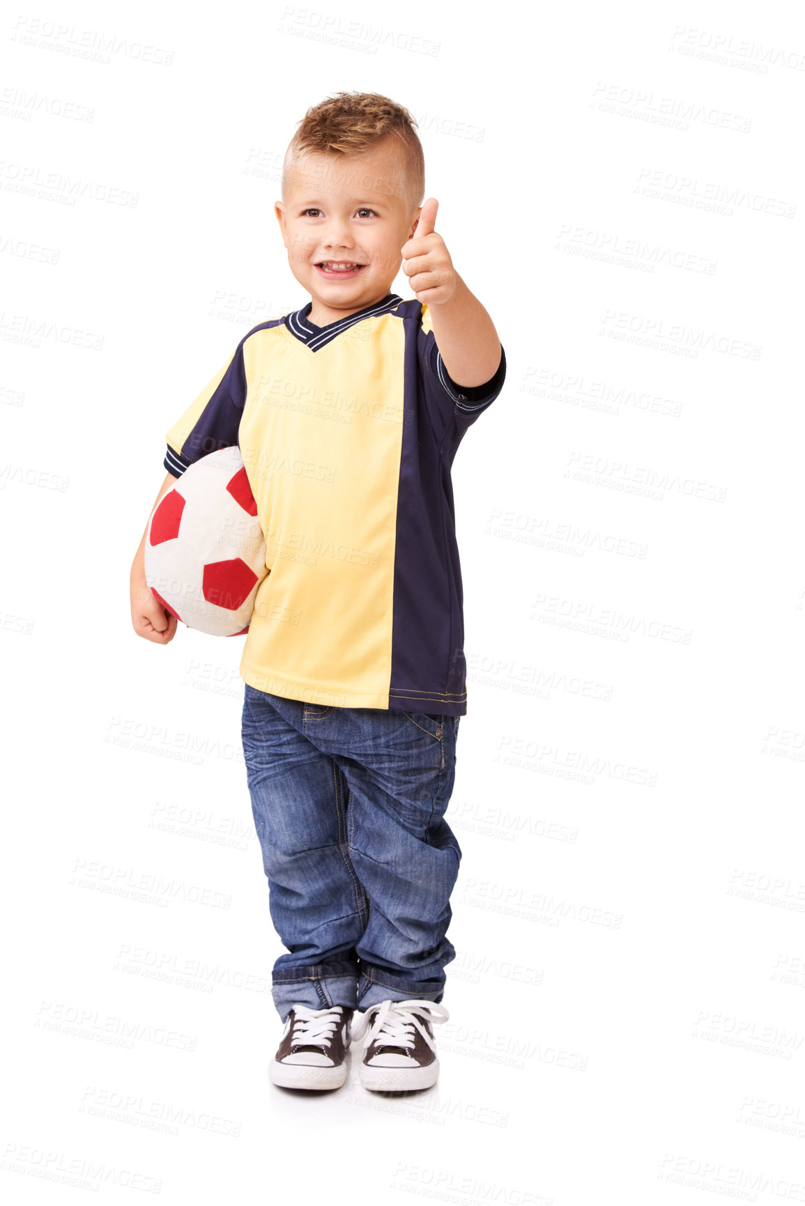 Buy stock photo Studio shot of an adorable young boy carrying a soccer ball