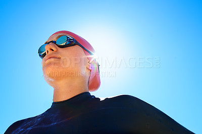 Buy stock photo Swimmer, woman with low angle and athlete outdoor, blue sky with sunshine and water sport for fitness. Exercise, training for swimming and workout, summer and lens flare with mockup space and goggles
